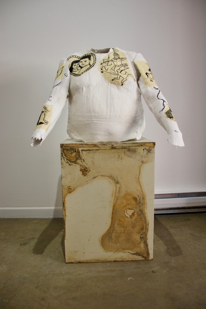 Photo of bust with tattoos